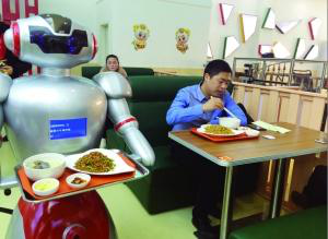 有图有真相 餐厅机器人齐刷刷卖萌上岗2.png